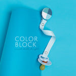 Classy Paci Hues of Blues Colorblock circle pacifier clip