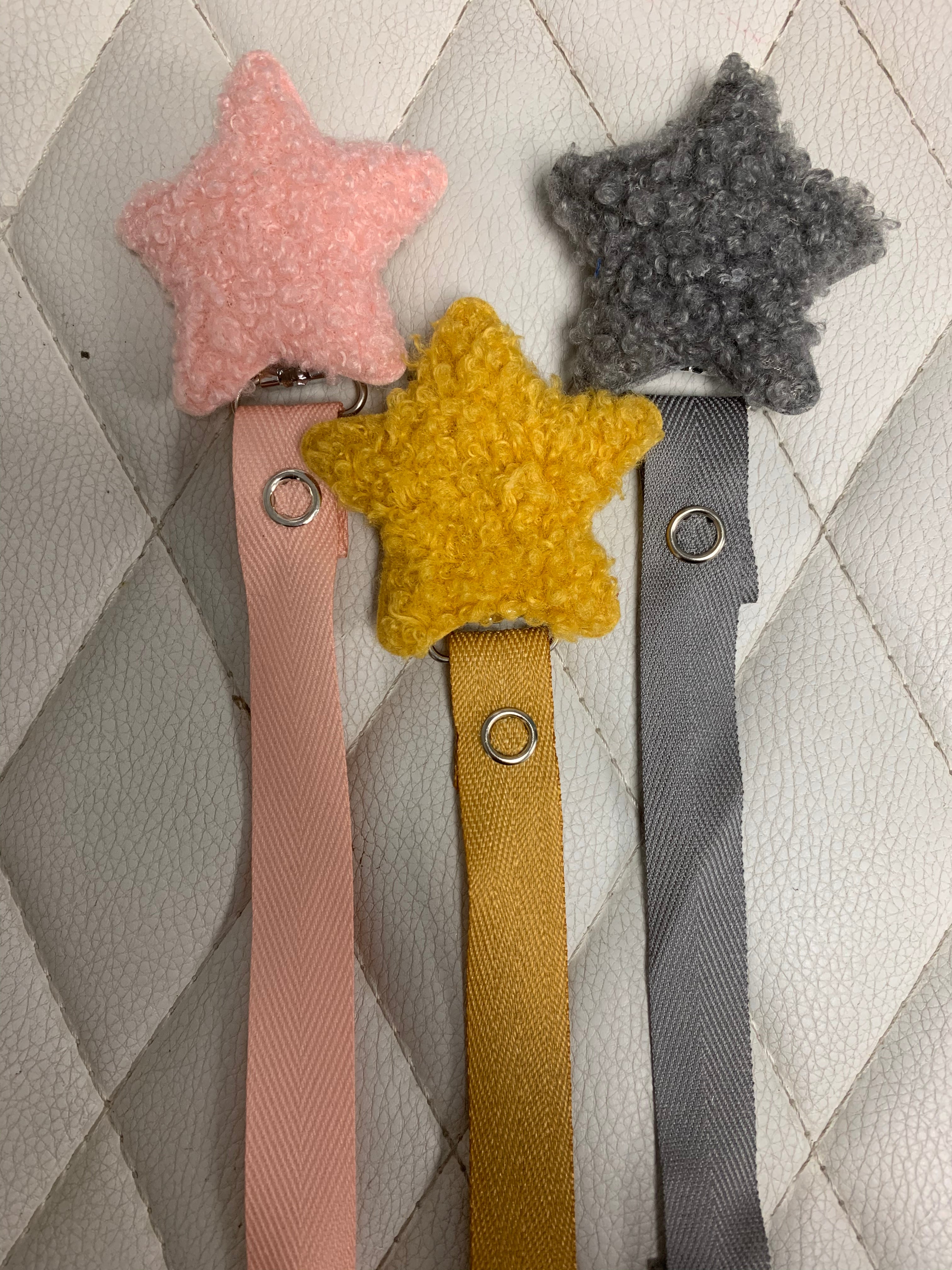 Sherpa Shapes = stars in many colors , grey, off white, navy, cozy pacifier clips